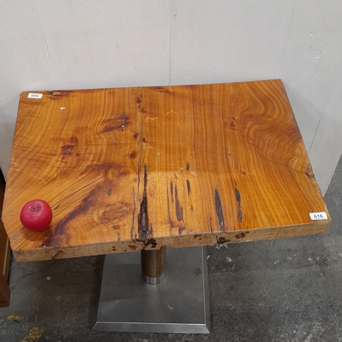 616 - Rustic wooden table with natural grain top on a metal pedestal base. Approximate dimensions: 30