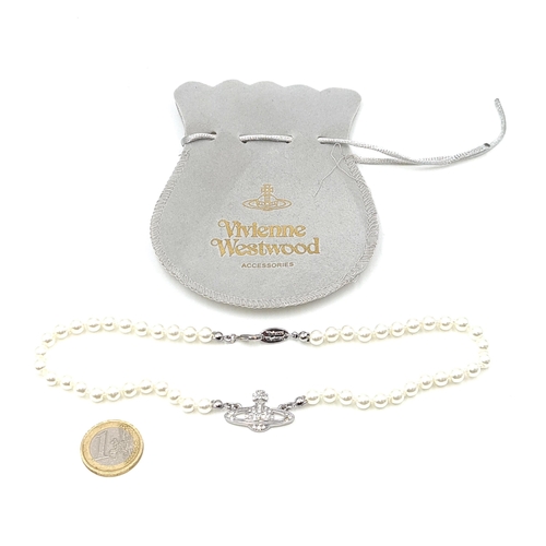 504 - A Vivienne Westwood pearl necklace set with lobster clasp. Length 36cm. In original pouch.