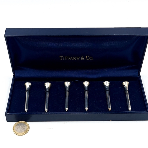 507 - A collection of six Sterling Silver golf tee pegs by Tiffany & Co., (each peg marked Tiffany) total ... 