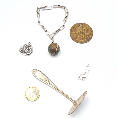 535 - A collection of items consisting of a Charles sterling silver (pusher) hallmarked Birmingham, togeth... 