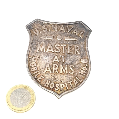 543 - An original  US Naval Master at Arms mobile Hospital no. 6 badge. This WWII badge was from the Phili... 