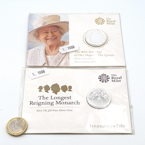 544 - Two sterling silver UK mint 20 pound coins, one celebrating the 90th birthday of Queen Elizabeth II ... 