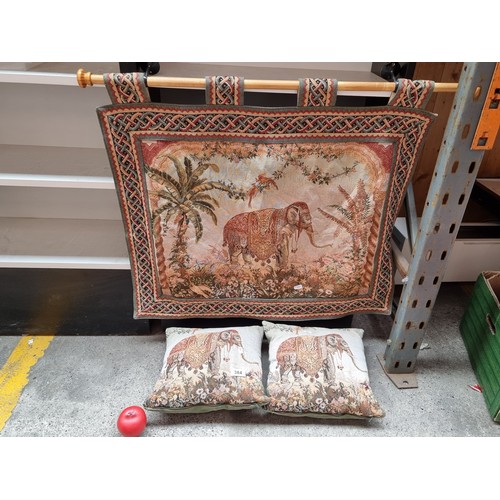 384 - A beautiful Buckingham tapestry on  wooden pole, entitled Elephant along with two matching cushions.