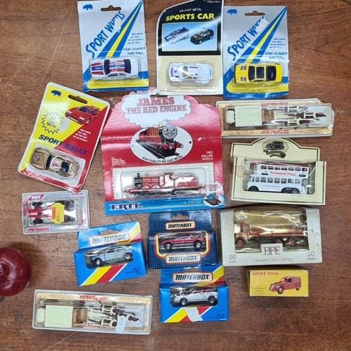 718 - Collection of 14 Die-Cast Model Vehicles. Includes brands such as Matchbox, Majorette, Dinky Toys, a... 