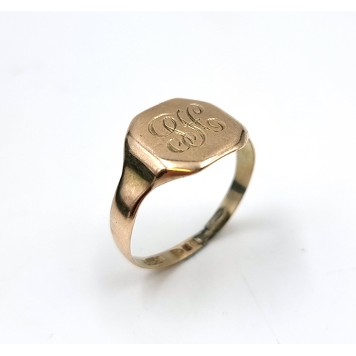 549 - A vintage nine carat gold 375 initialed signet ring. Size R. Weight 3 grams. (ring resized).