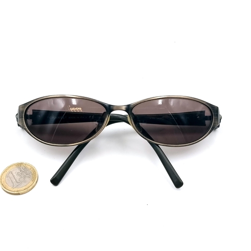 552 - A pair of designer Chanel sunglasses marked made in Italy with serial numbers to frame. Glasses and ... 