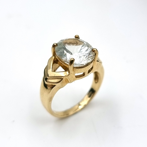 557 - A nine carat gold imperial andesine stone ring. Stone 2.73 carats. Size O. Weight 3.59 grams. Andesi... 