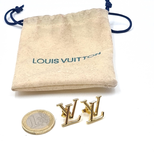 579 - A pair of designer Louis Vuitton stud earrings. Set with Louis Vuitton insignia mounts. Total weight... 