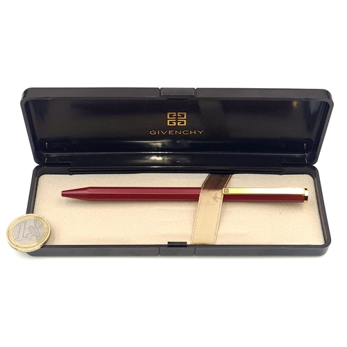 594 - A designer as new original Givenchy ball point pen set with burgundy resin body and gold metal accen... 