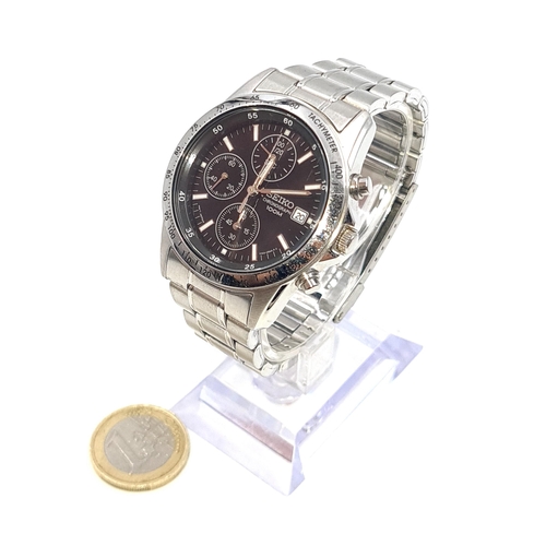 597 - A SEIKO large face chronograph wrist watch. Water resistant to 100m with original Seiko bracelet. We... 