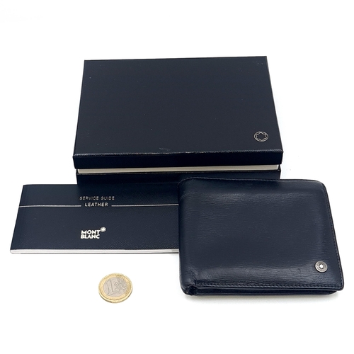 598 - Star Lot : An original  Mont Blanc leather wallet set with Mont Blanc decal. Comes with service guid... 