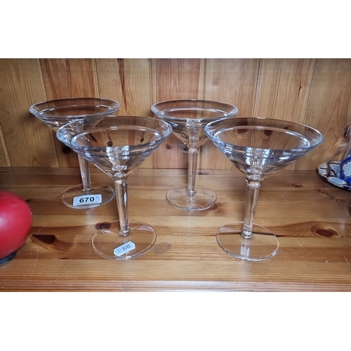 670 - Set of four large Marc Jacobs for  Waterford martini glasses with sleek, elegant design. Lovely clea... 