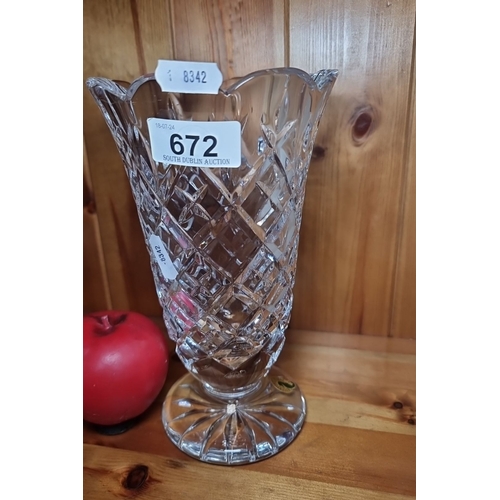 672 - Waterford crystal vase with intricate cross-hatch pattern, marked 'Waterford' on the base. Height ap... 