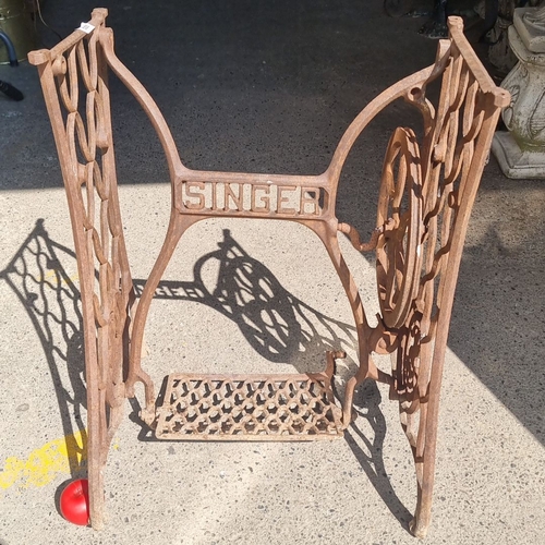 688 - Vintage Singer Sewing Machine Treadle Base, cast iron. Features intricate design and 