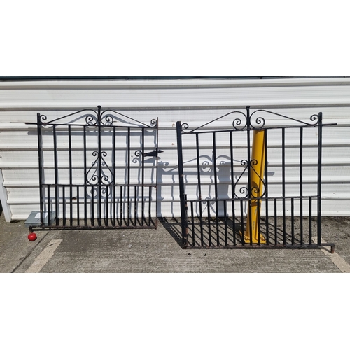 692 - Star Lot : Pair of vintage wrought iron gates with decorative scrollwork. Features an upper arched d... 