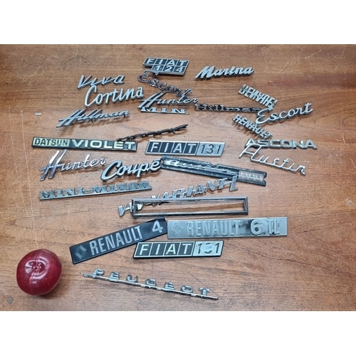 728 - 24 vintage car badges featuring brands like Fiat, Cortina, Hunter, Mini Minor, Datsun, Renault, Asco... 