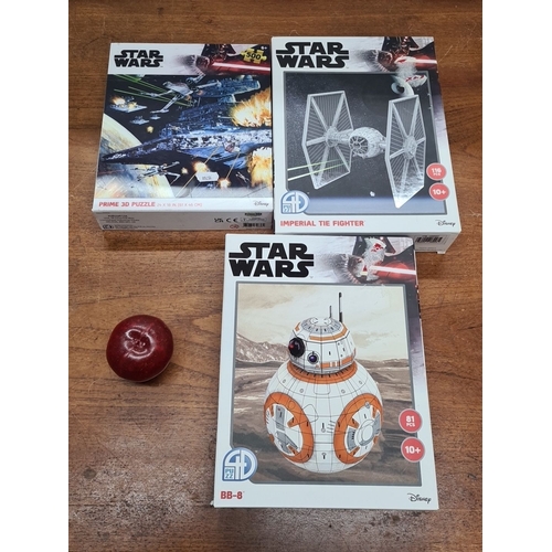 731 - Set of 3 Star Wars heavy substantial Puzzles:
1. Prime 3D Puzzle, 500 pieces.
2. Imperial Tie Fighte... 