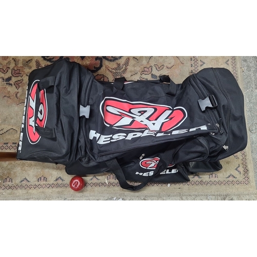 737 - Hespeler Black Sports Equipment Bag with multiple zippered compartments, durable handles, and large ... 