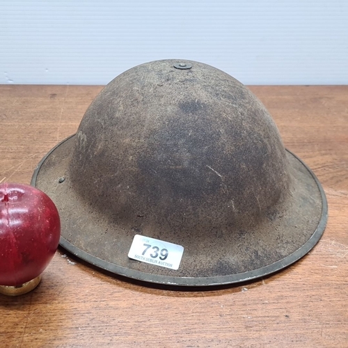 739 - British Army Mark II Broddie helmet from the WWII-era with an intact internal suspension system and ... 