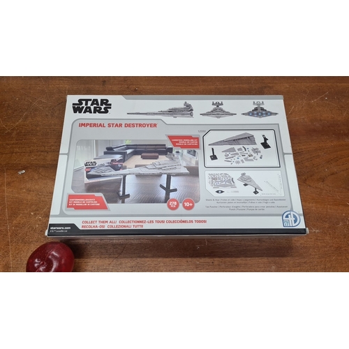 752 - A large Star Wars Imperial Star Destroyer model kit. Includes 278 pieces. Produced by Disney and Luc... 