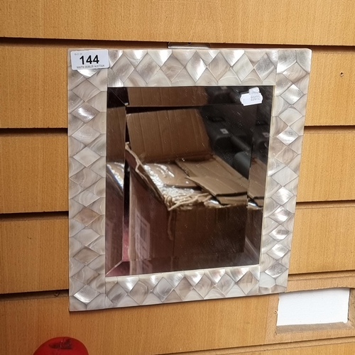 144 - A very pretty vintage Mother of Pearl shell framed bevelled mirror.