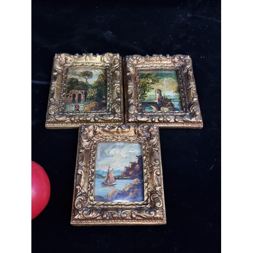 165 - A trio of miniature Italian oil on board paintings featuring landscape scenes. Housed in elaborate m... 