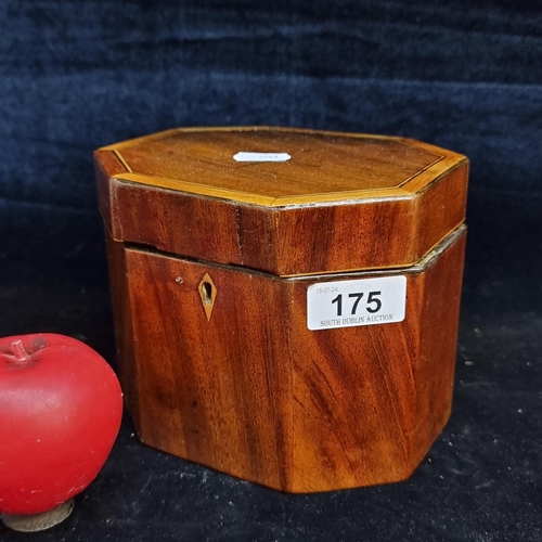 175 - An antique handmade octagonal wooden box with a hinged lid and inlay design to top.