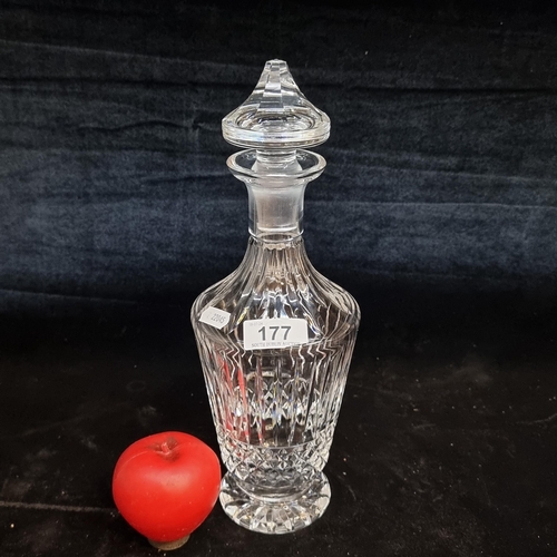 177 - A fabulous tall Waterford Crystal decanter with stopper. In good condition with acid marks to base.