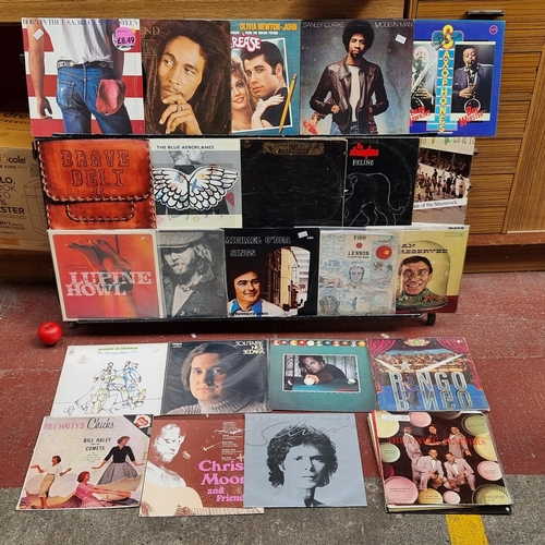 187 - 28 vinyl records from artists such as Bruce Springsteen, The Stranglers, Stanley Clarke, Bob Marley ... 