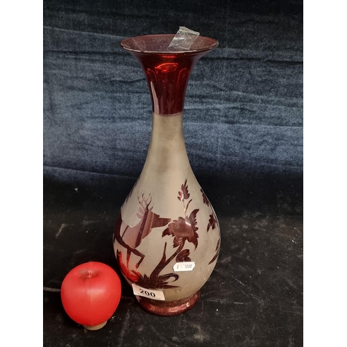 200 - A highly intricate hand blown glass vase boasting an etched woodland scene. Large pontil mark to bas... 