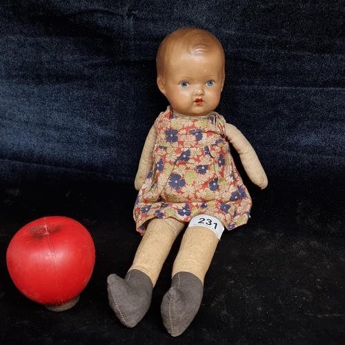 231 - A wonderful vintage mid century hand painted child's doll, in period clothing.