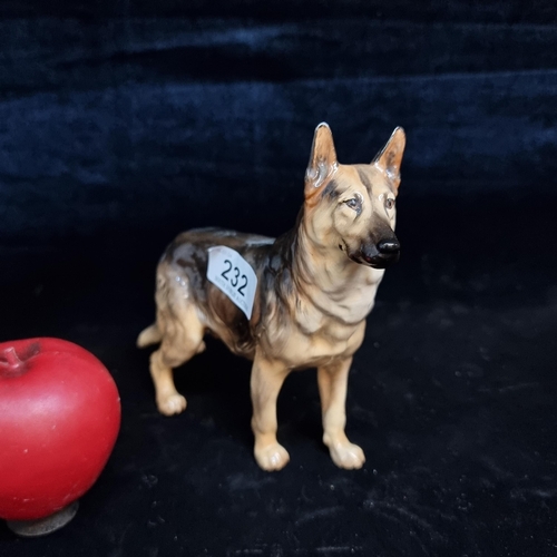 232 - A beautiful Royal Doulton figure of a German Sheppard dog. In very good condition.