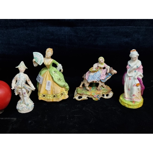 233 - Four delicate antique porcelain german figurines. All hand painted and beautifully made.