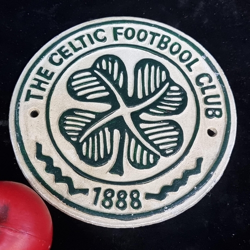 241 - A heavy cast metal wall plaque of Celtic Football Crest.