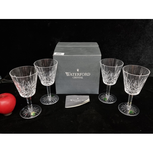 337 - An as new set of four Waterford Crystal goblet glasses in the Lismore pattern with original box. All... 