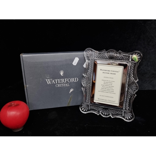 338 - An as new Waterford Crystal Victorian fitted pictured frame in original box.