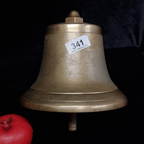 341 - A very heavy antique large brass call bell with unusual mechanism..