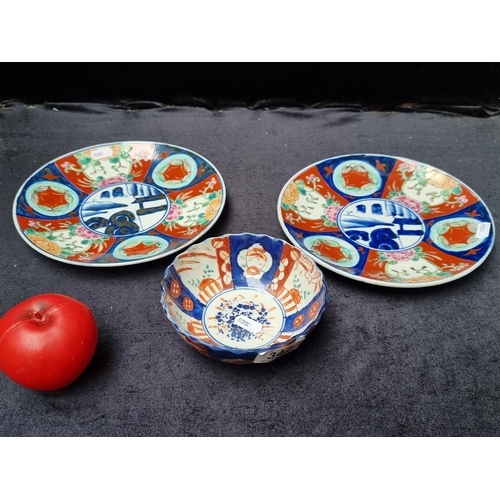 342 - Three pieces of vintage Japanese Imari porcelain. Includes two plates and a scalloped edge bowl all ... 