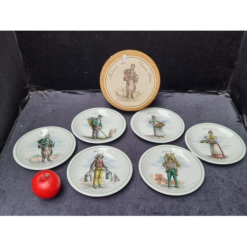 344 - A complete set of six 'Trades of Paris' porcelain plates. In excellent condition in original bamboo ... 