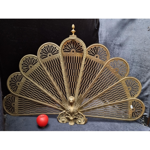 358 - A late Victorian brass fan fire screen with Phoenix bird design.