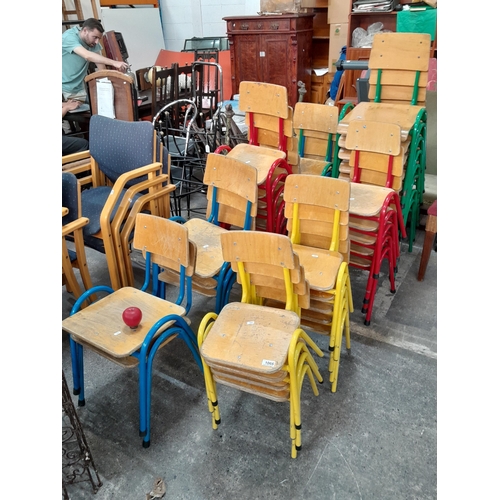 1066 - Star lot : A charming selection of childrens wood chairs with colorful metal frames. Thirty-eight in... 