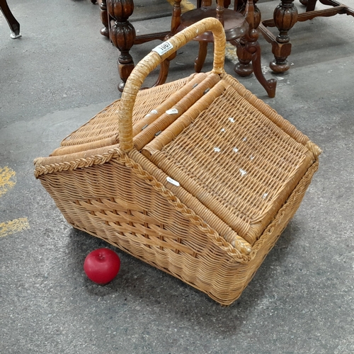 1067 - A large Wicker Double Lidded Picnic Basket.