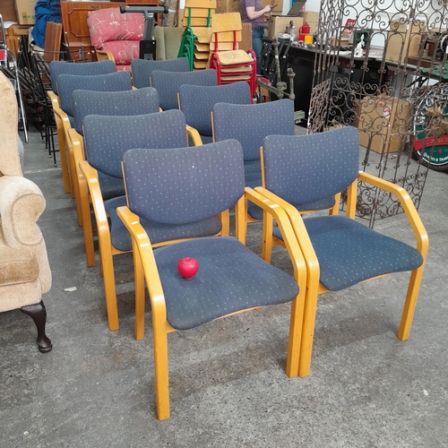 1070 - A set of 10 stackable reception chairs with arms. Stamped and dated to frame beneath.