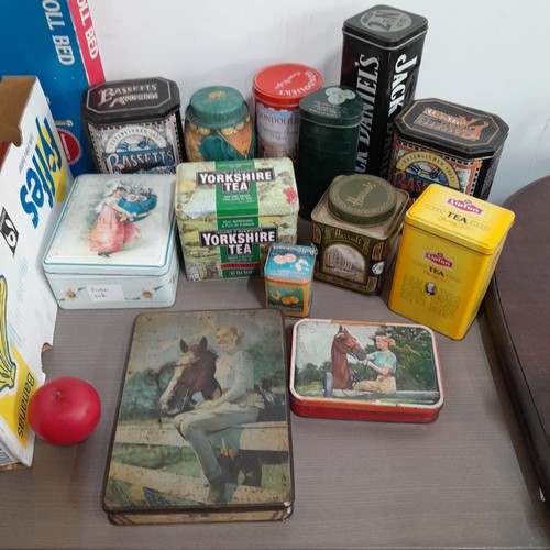 1062 - Three boxes containing a variety of vintage storage tins including some Pokemon trading card game ti... 