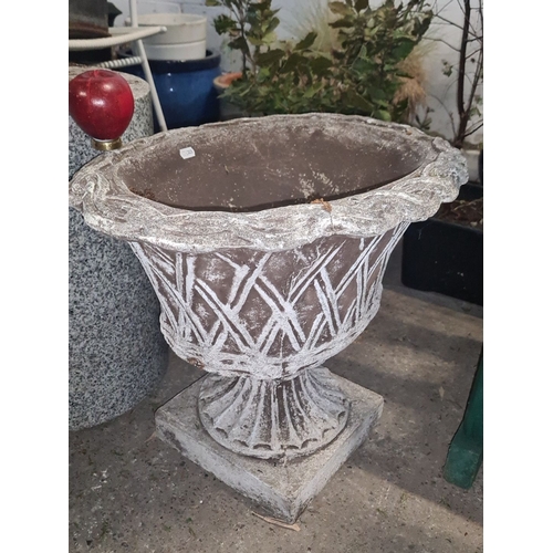 700 - Star Lot : A large Decorative garden planter, cast stone with a classic pedestal base and lattice de... 