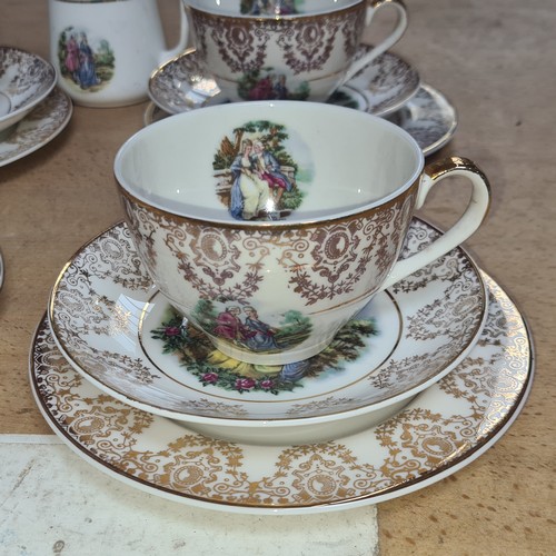 444 - A 32 piece English translucent China set. Includes cups, saucers, side plates and milk jug.