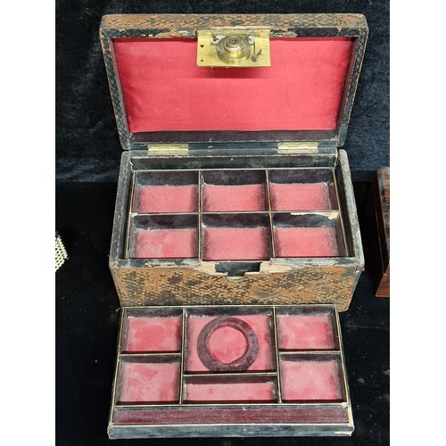 162 - Two beautiful antique jewellery boxes including a 'M.M.' monogramed embossed leather bound Mansfield... 