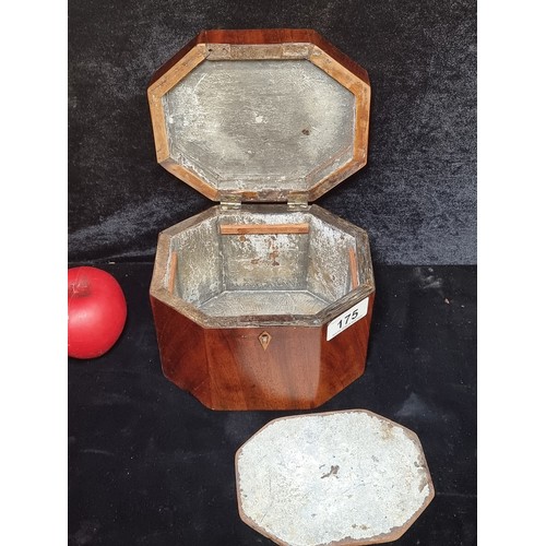 175 - An antique handmade octagonal wooden box with a hinged lid and inlay design to top.