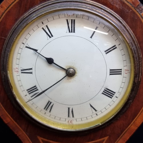 196 - A fabulous shaped early 20th Century mahogany balloon head mantle clock boasting beautiful marquetry... 