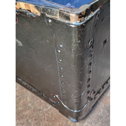 1179 - A very large Vintage travel trunk / chest with stud reinforcements to sides and top, opening to reve... 